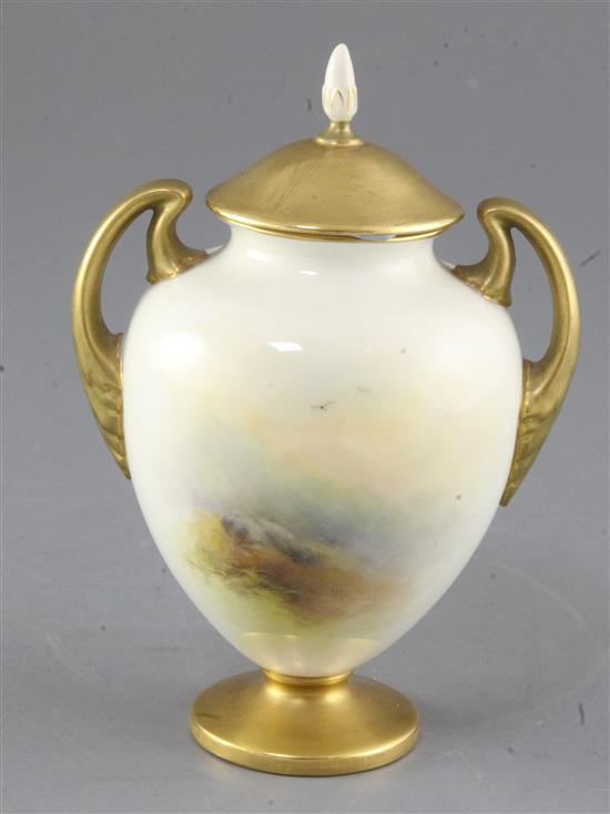 Harry Stinton for Royal Worcester. A two handled ovoid vase and cover, c.1936, height 17cm